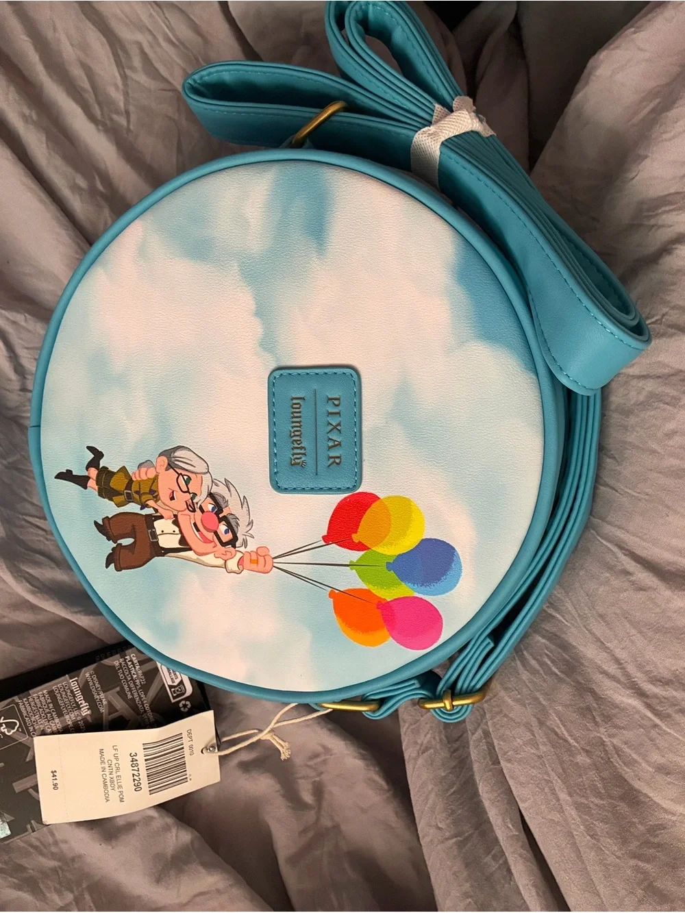 Loungefly Turquoise Round Crossbody with Multicolor Pom-Poms